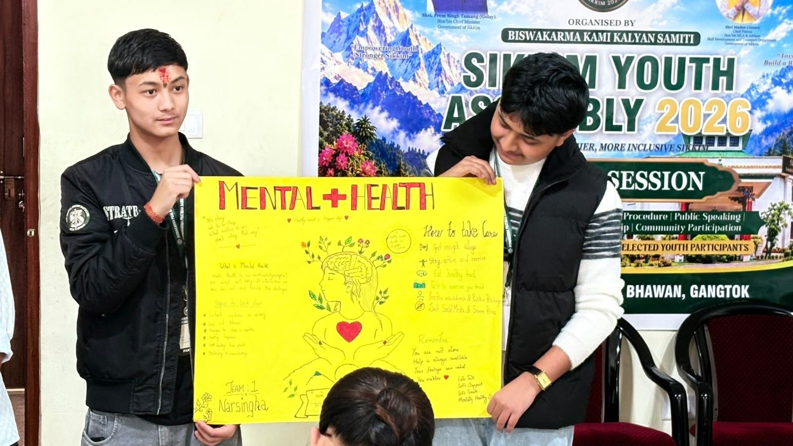 Participants presenting their poster