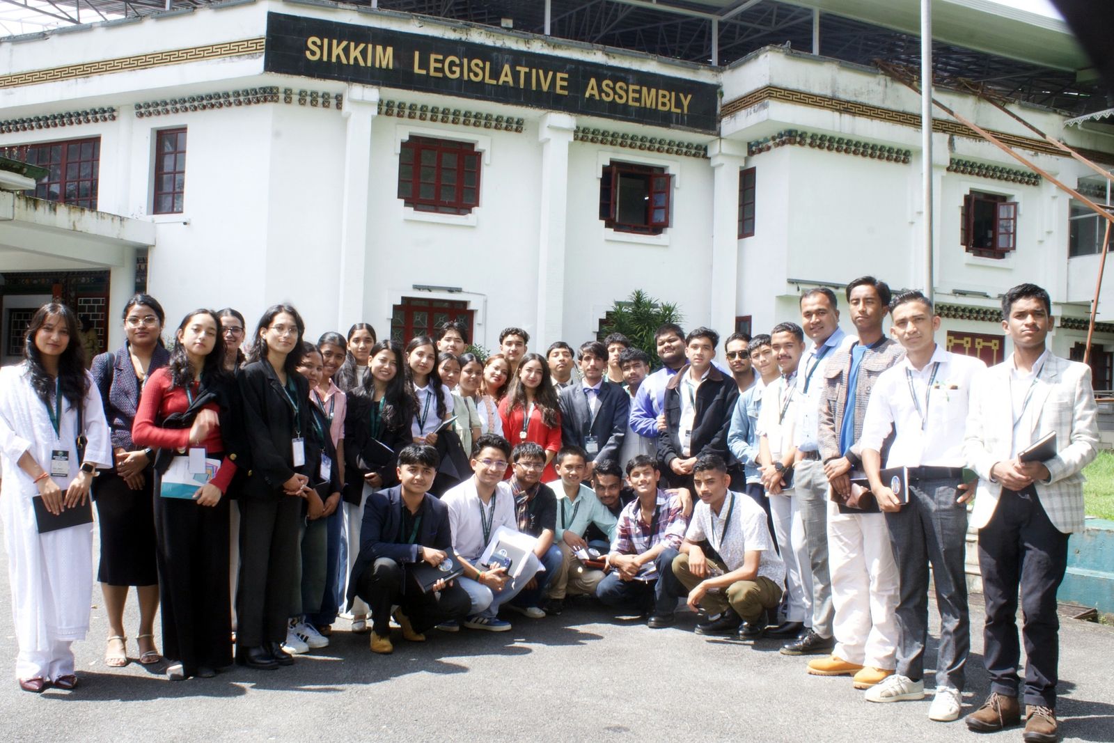 The group in front of the Sikkim Legislative Assembly
